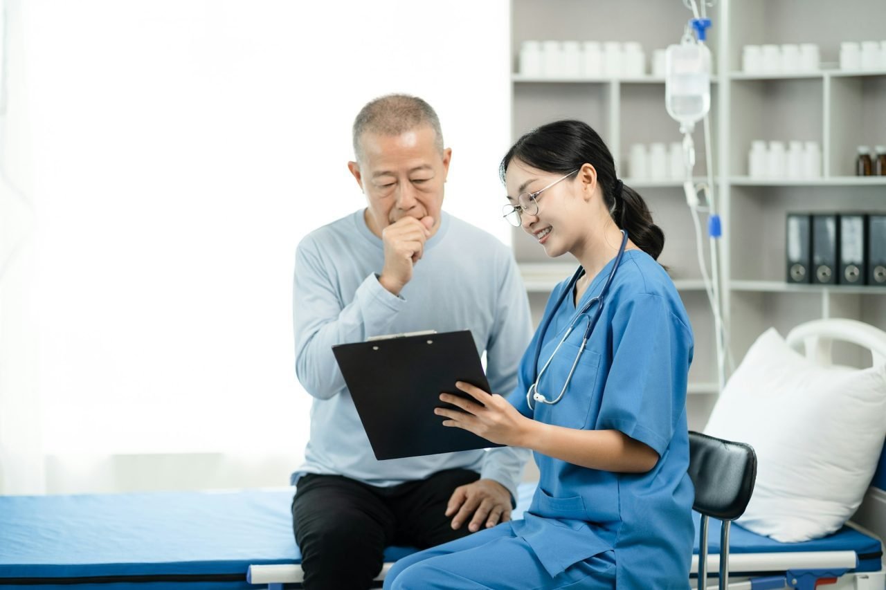 concerned-senior-old-patient-patient-talks-with-healthcare-professional-.jpg
