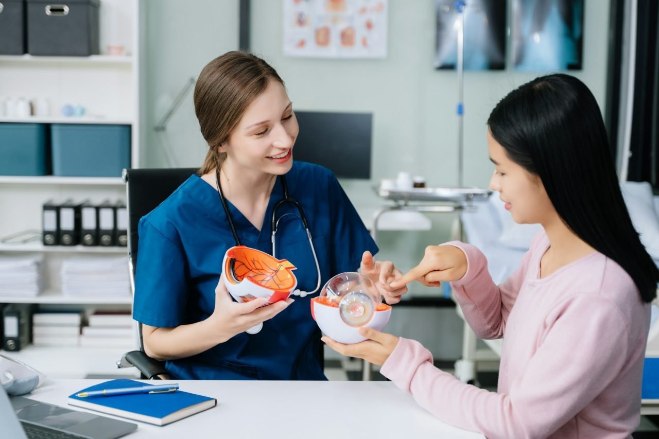 portrait-of-female-doctor-explaining-diagnosis-to-her-patient-doctor-meeting-with-patient.jpg